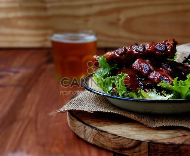 Succulent grilled ribs and beer - Free image #136673
