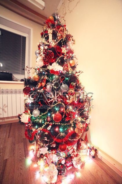 Decorated Christmas tree in room - Free image #183933