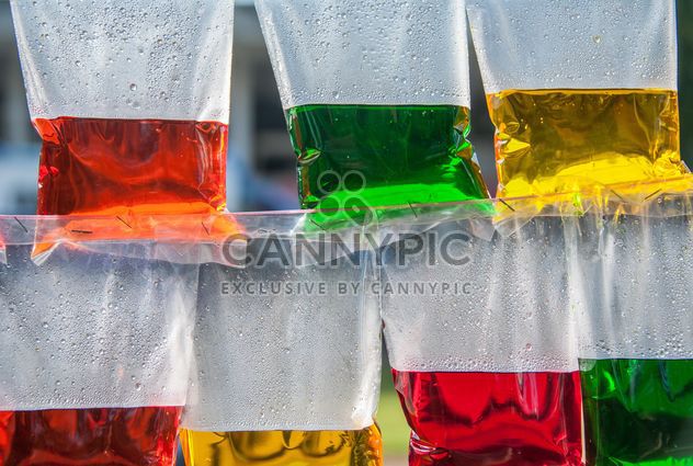 Colored water in plastic bags - image #186393 gratis