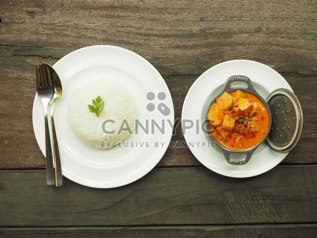 Mussamun Kai curry on wooden background - Free image #187053