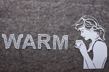Girl with cup of coffee and word warm made of laced letters - image #327303 gratis