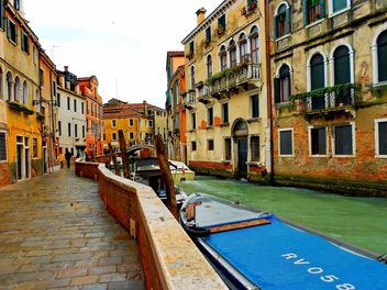 Gondolas on canal in Venice - image #333683 gratis
