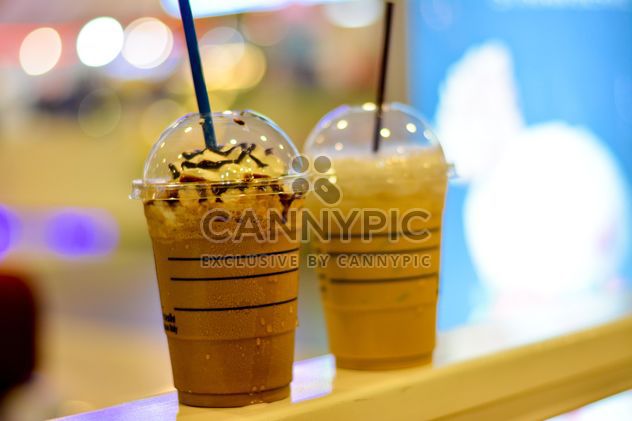Coffee with ice in plastic cups - image gratuit #380503 