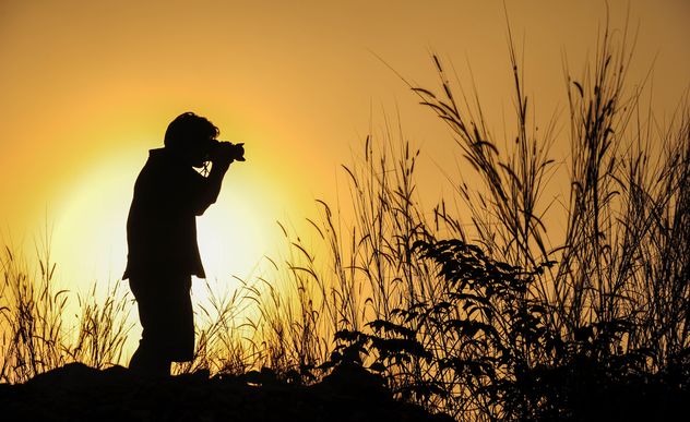 Photographer silhouette at sunset - Kostenloses image #186463