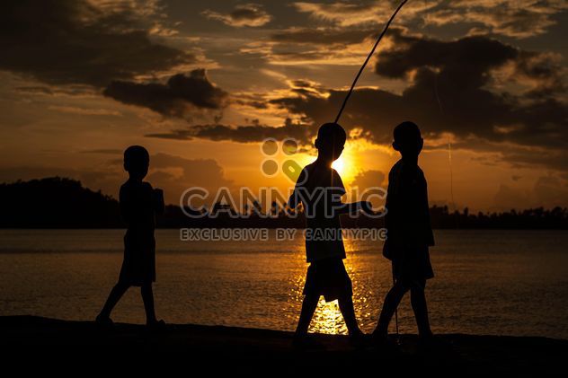Silhouettes at sunset - Free image #186543