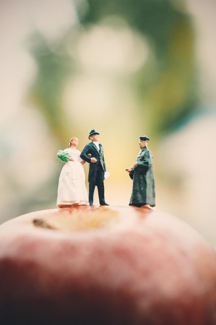 Miniature people on apple - Free image #187123