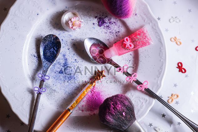 colored sequins in a spoon and a plate - image #187303 gratis