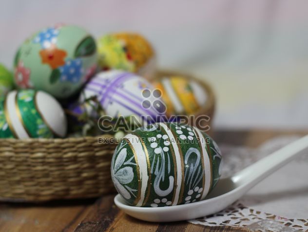 Painted Easter eggs on table - image #187543 gratis