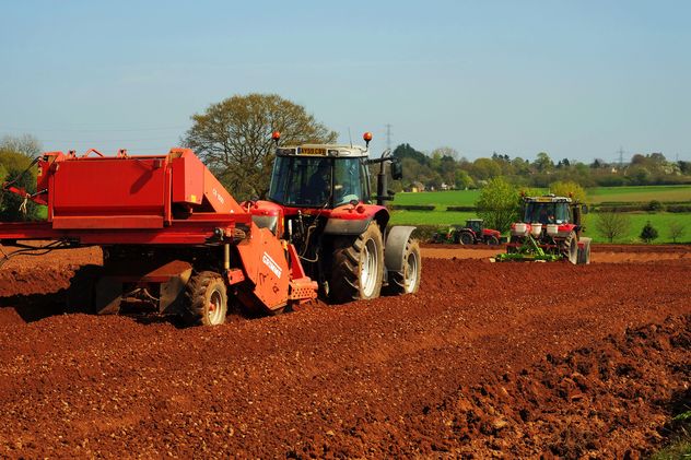 Tractor ploughing field - Free image #198353