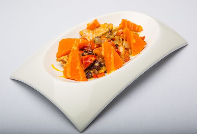 Dish of pumpkin on the plate on white background - Free image #198723