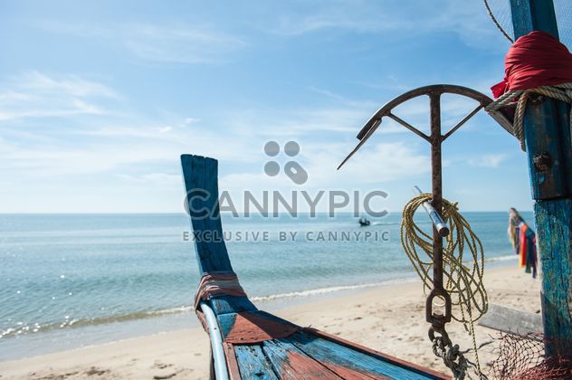 Fishing boat on a beach - бесплатный image #273543