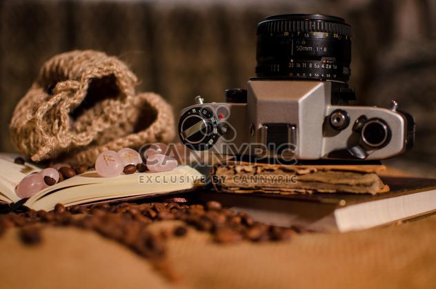 Old camera, books, runes and coffee beans - бесплатный image #275323