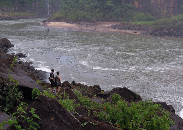 Argentina-Iguazu-A lucky couple enjoying the view of falls - image gratuit #299973 