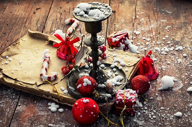 Candlestick, old book and Christmas decorations - бесплатный image #302023