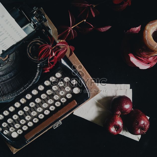 Typewriter with red apples - image #303363 gratis