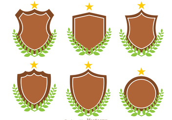 Shield And Leaf Vectors - Free vector #305633