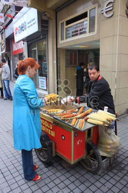Russian Tourist buying corn - image #305743 gratis