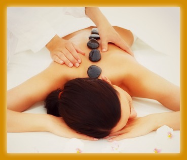 Beautiful woman receiving hotstone massage at spa - Kostenloses image #309383