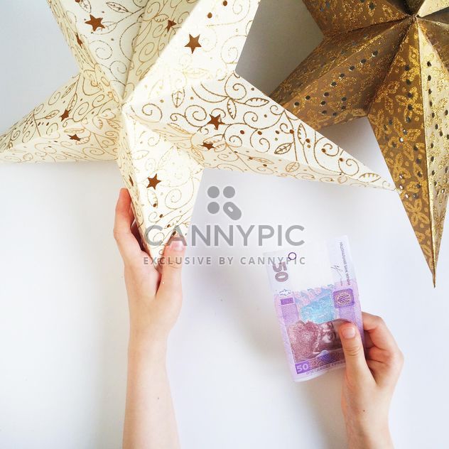 two stars and money on white background - image #329223 gratis
