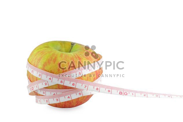 Ripe apple and measuring tape - image gratuit #329653 