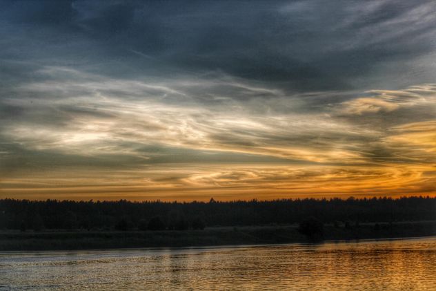 Sunset on a lake - image #329953 gratis