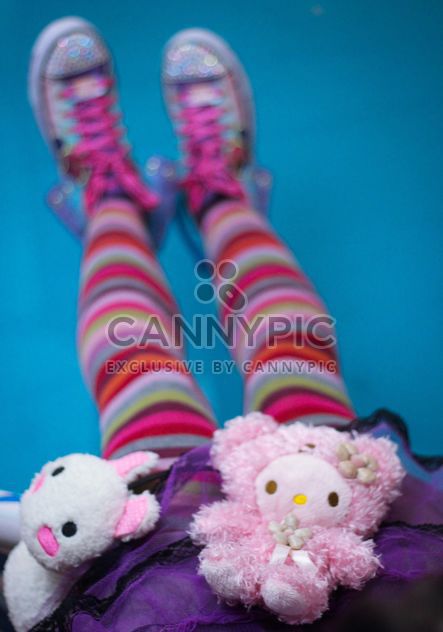 Girl in colorfull tights with soft toys - бесплатный image #342123