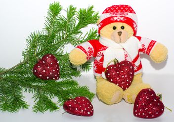 A teddy bear in the branches of spruce, new year, Christmas composition - Kostenloses image #342493