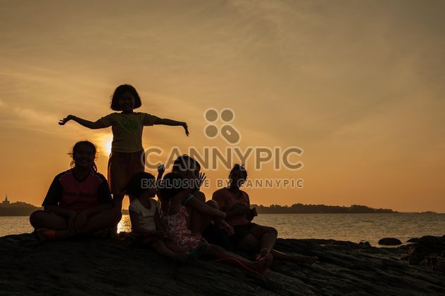 Children on a sea at subset - Free image #344083