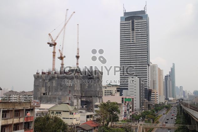 High-rise building under construction, Bangkok Thailand - бесплатный image #346243