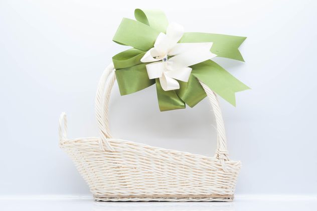 White wicker basket on white background - бесплатный image #347233