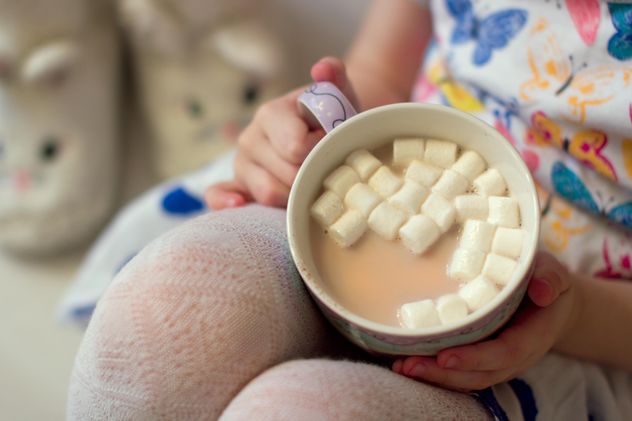 Cup of cocoa with marshmallows in child's hands - Free image #347963