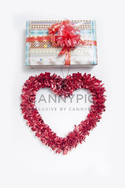 Decorated gift box and heart on white background - image gratuit #452553 